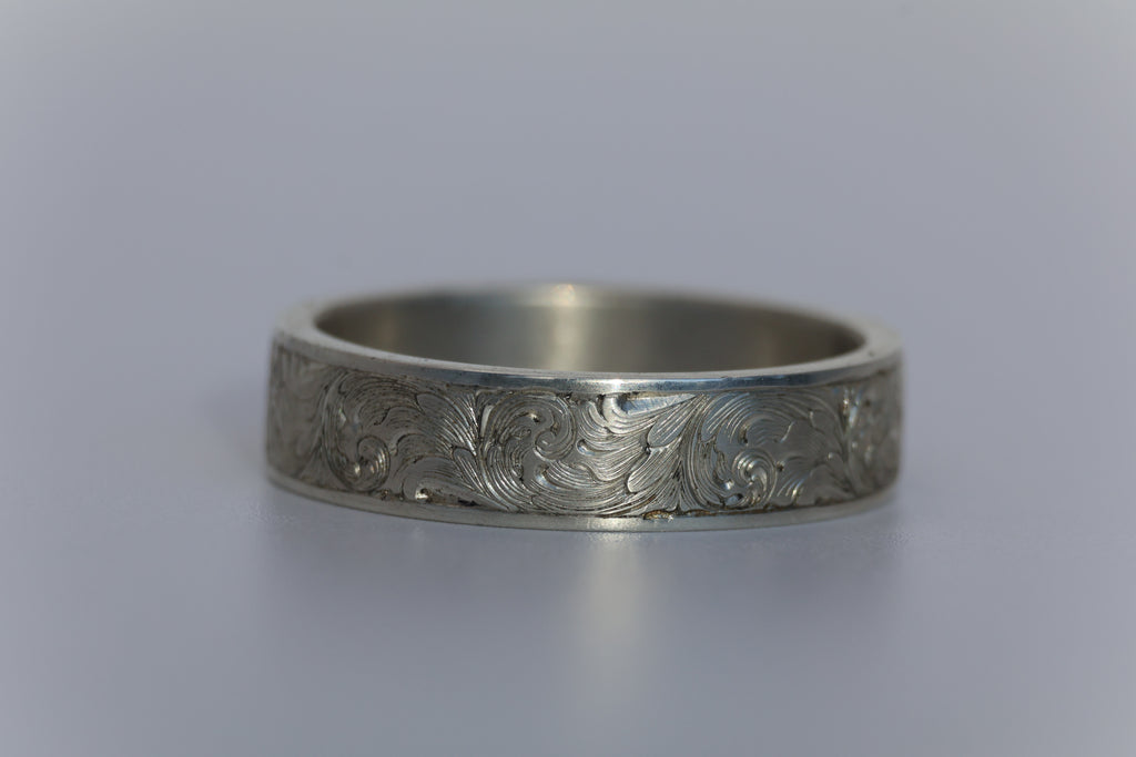 Custom Hand-Engraved Scroll wedding band.