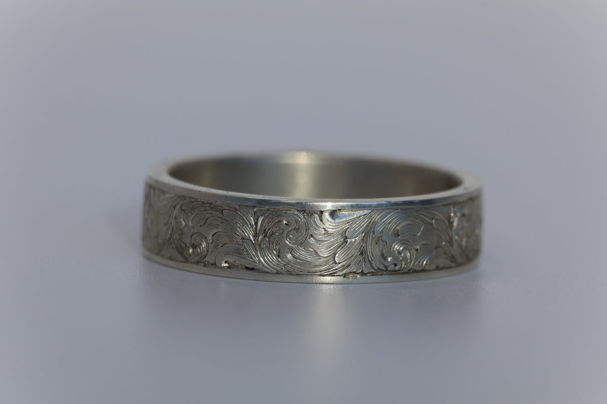 Custom Hand-Engraved Scroll wedding band.